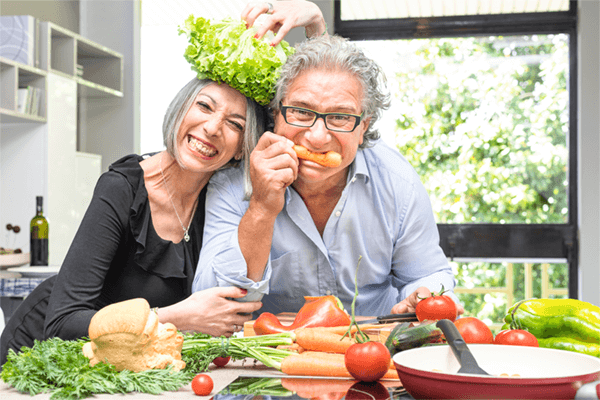 Couple-In-Kitchen-Having-Fun